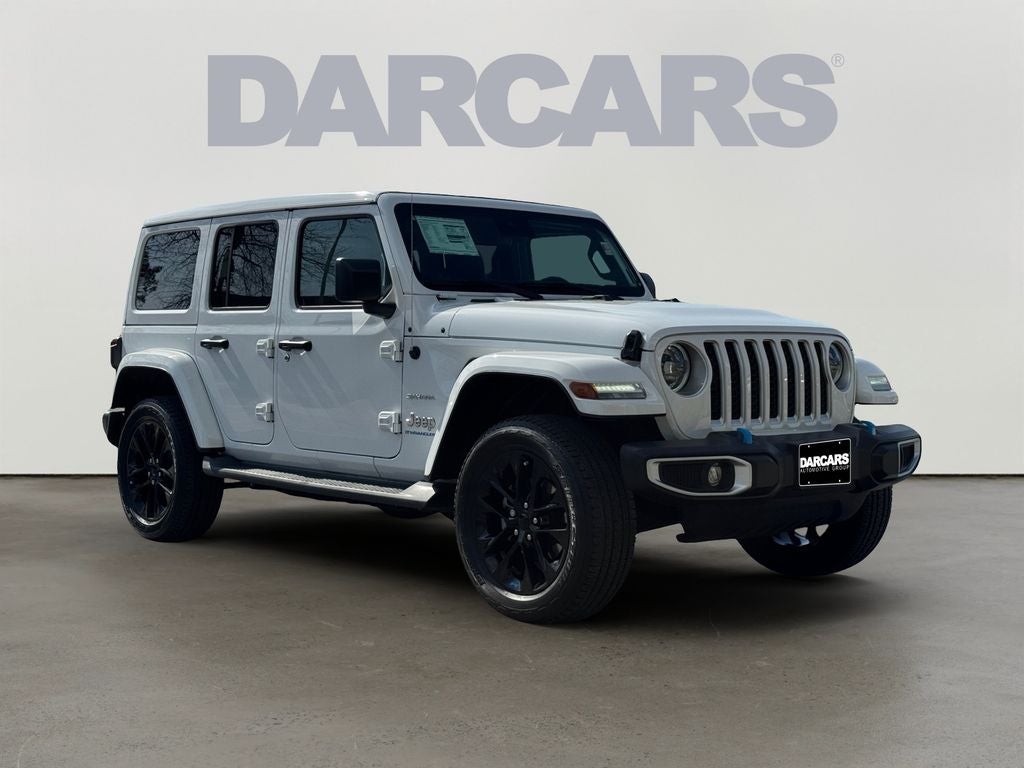 2023 Jeep Wrangler Sahara 4xe in Bright White Clearcoat — front three-quarter view