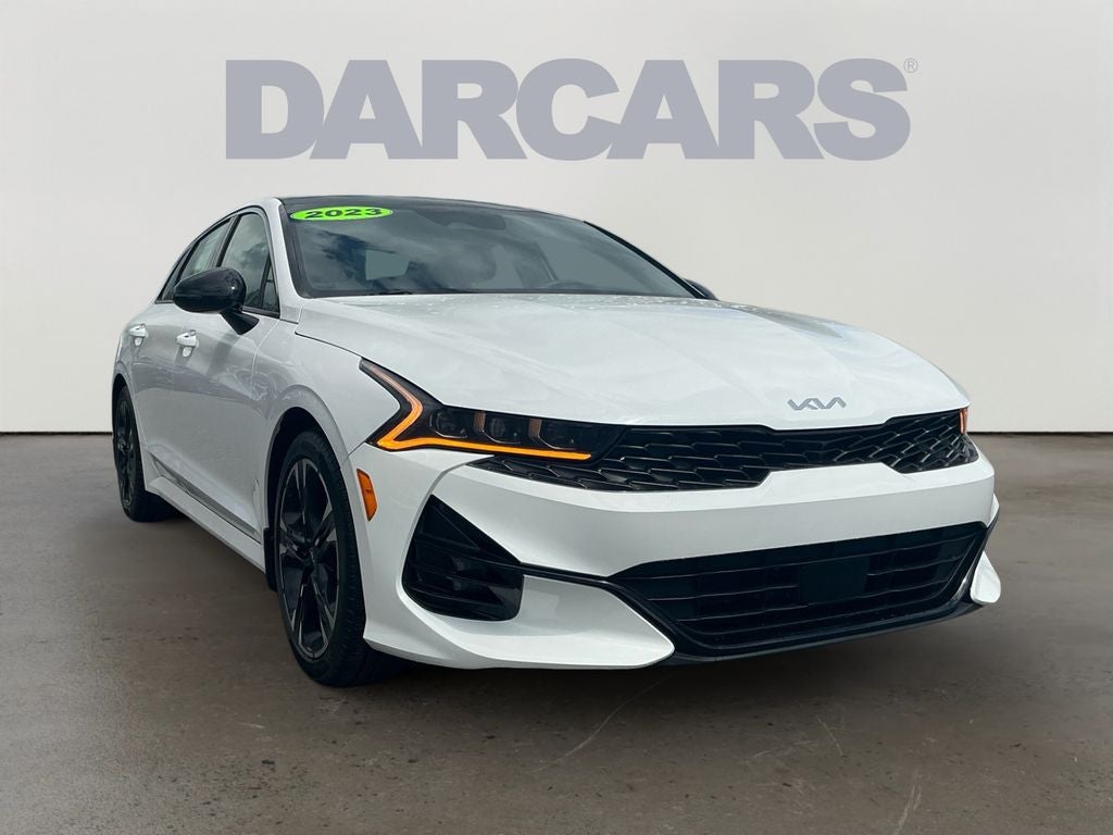 2023 Kia K5 GT-Line AWD in Glacial White Pearl — front three-quarter view