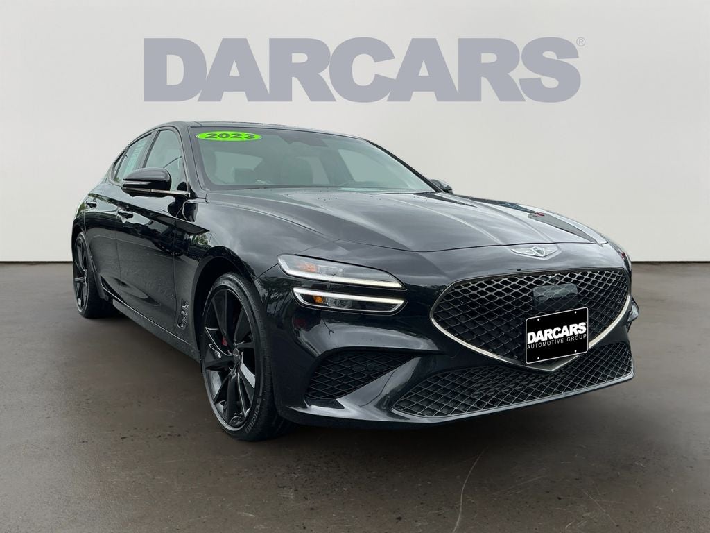 2023 Genesis G70 3.3T in Vik Black — front three-quarter view